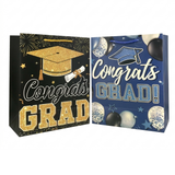 Two graduation-themed gift bags with 'Congrats Grad!' text on a white background.